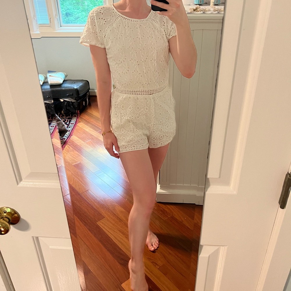 Tila Rosa white floral romper, fits like size 6 super soft!